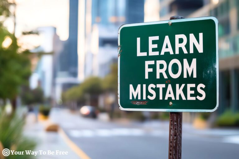 Motivational sign on city street with text 'Learn from Mistakes', emphasizing the importance of learning from errors in life