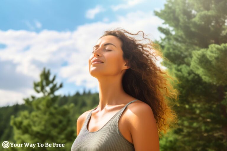 Relaxed woman breathing fresh air in a green forest. she is enjoying a moment of solitude